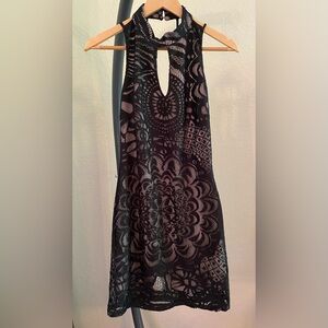 Cocktail Dress - black knit over nude. Mid thigh length